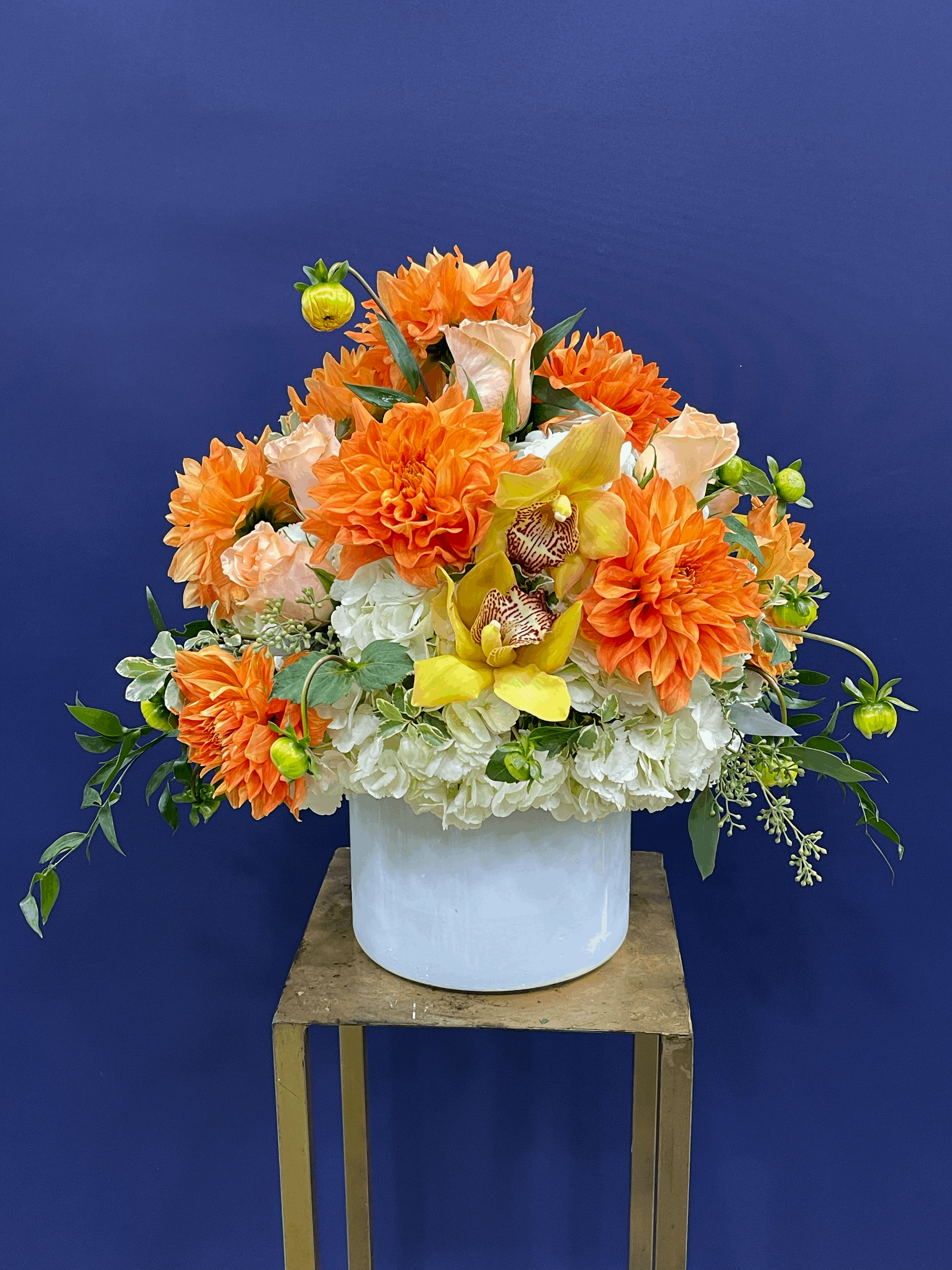 Hot Summer Arrangement Yellow orchid arrangement for birthday — Flower Empire Aurora florist serving Mississauga