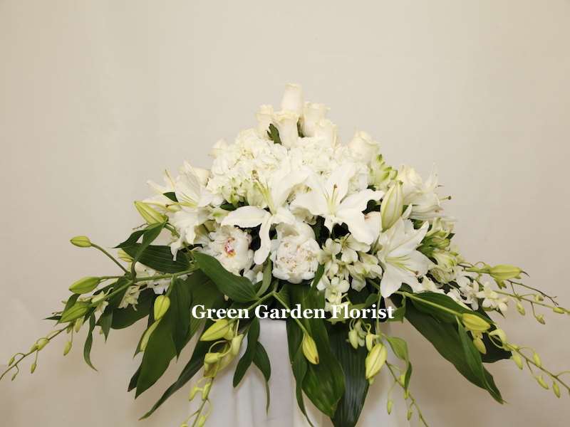 Sincere Sympathy Arrangement White orchid arrangement for funeral & sympathy — Flower Empire Aurora florist serving Etobicoke