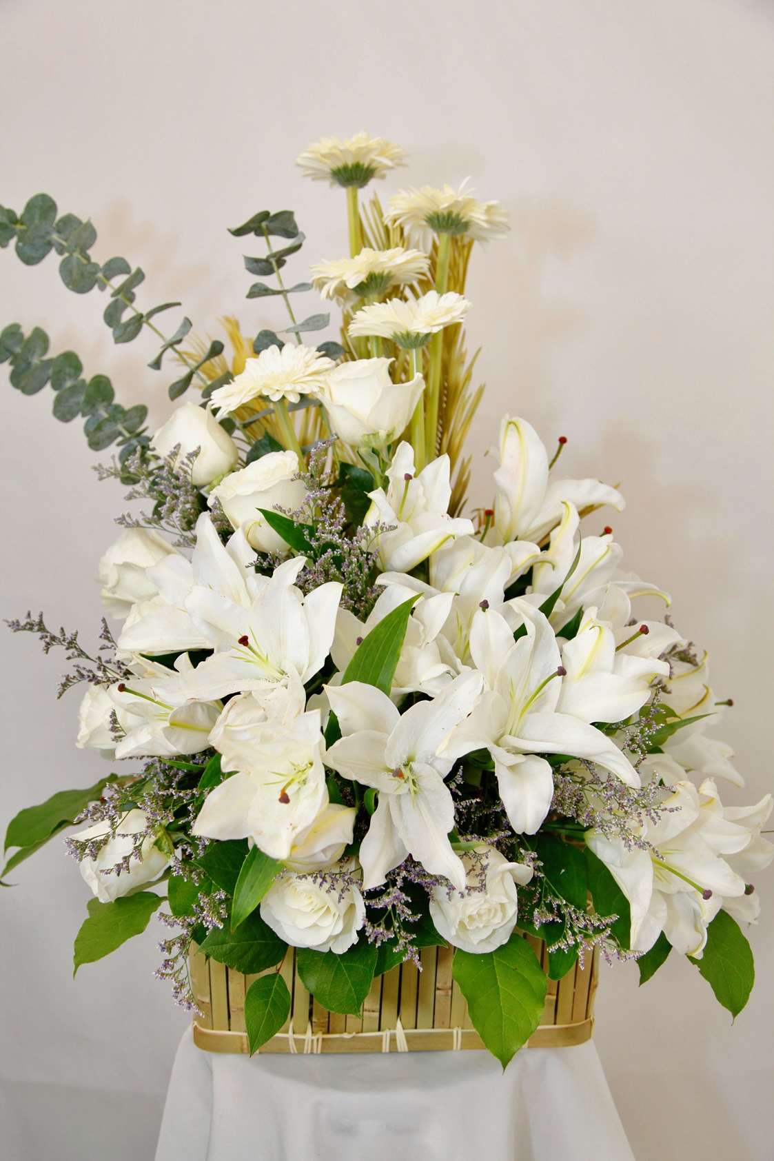 Free Spirit Arrangement White rose arrangement for funeral & sympathy — Flower Empire Aurora florist serving Toronto