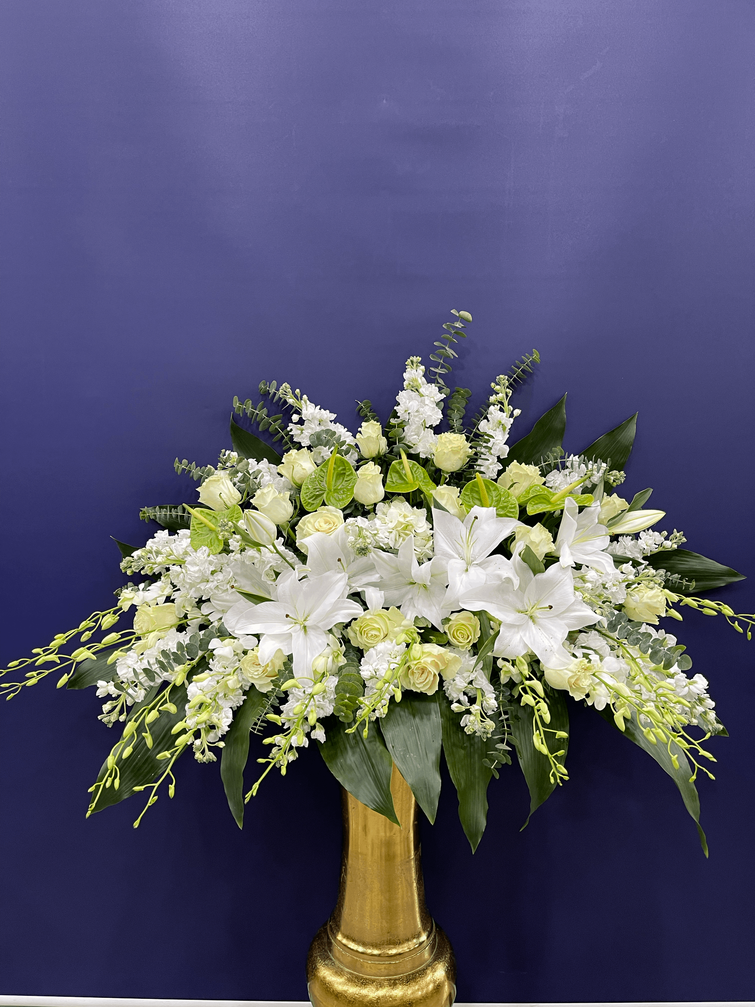 We Remember Casket Spray orchid casket spray for funeral & sympathy — Flower Empire Aurora florist serving Brampton