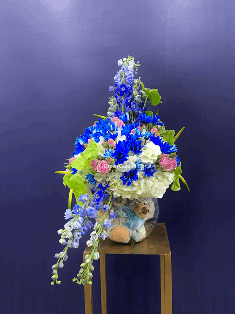 Sweet Baby Boy Arrangement Blue rose arrangement for newborn baby — Flower Empire Aurora florist serving Aurora