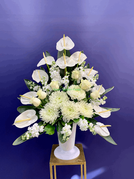 True Strength Arrangement rose arrangement for funeral & sympathy — Flower Empire Aurora florist serving Richmond Hill