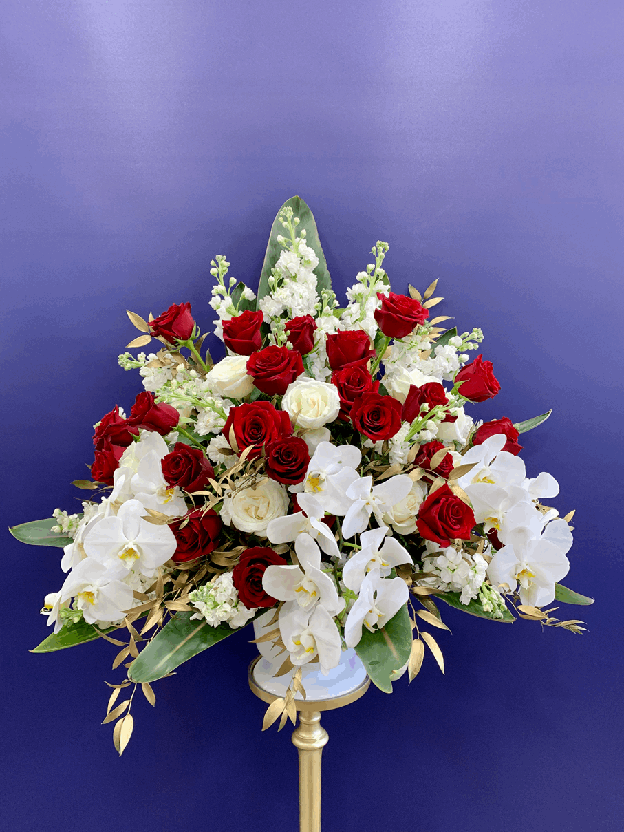 Red, White and Gold Arrangement Red orchid arrangement for funeral & sympathy — Flower Empire Aurora florist serving Newmarke