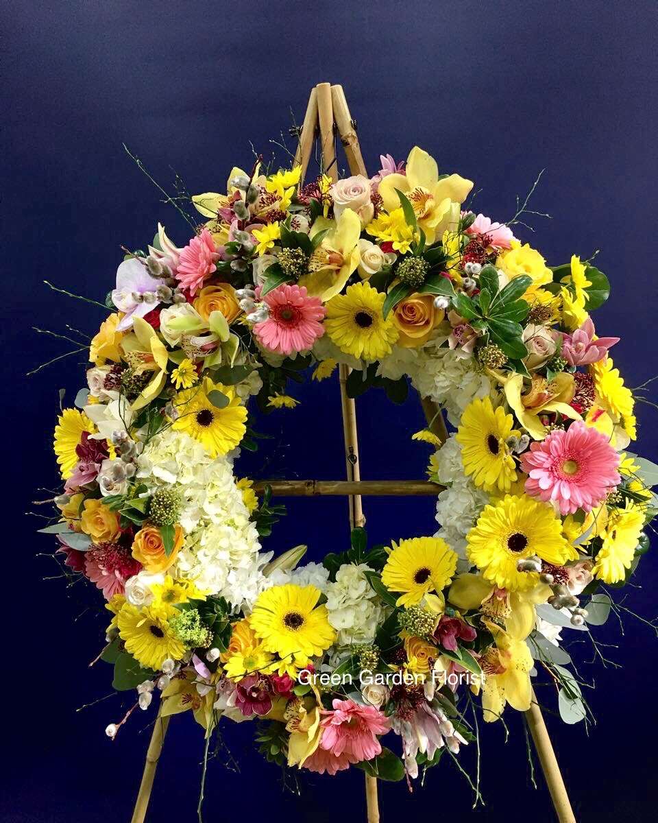 Springy colour Wreath Arrangement White orchid wreath for funeral & sympathy — Flower Empire Aurora florist serving Scarborou