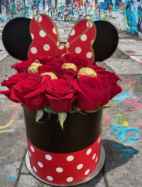 Minnie Mouse Red Rose Box with Ferrero Rocher Themed Minnie Mouse box arrangement of red roses and Ferrero Rocher chocolates by Flower Empire.