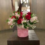 Red rose, pink alstroemeria, and baby's breath arrangement in a pink suede box — Flower Empire.