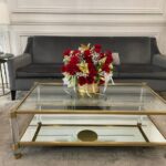 Elegant red-rose gold-vase arrangement with baby's breath and gold butterflies for living rooms and lobbies.