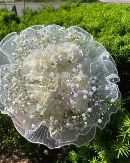 White carnation and baby's breath lace posy with pearl-style accents