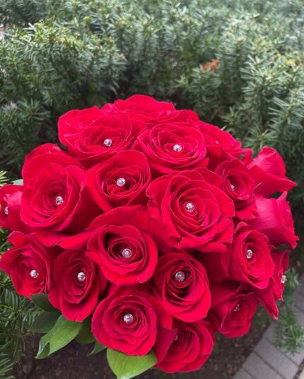 Red rose bridal bouquet with sparkling decorative accents