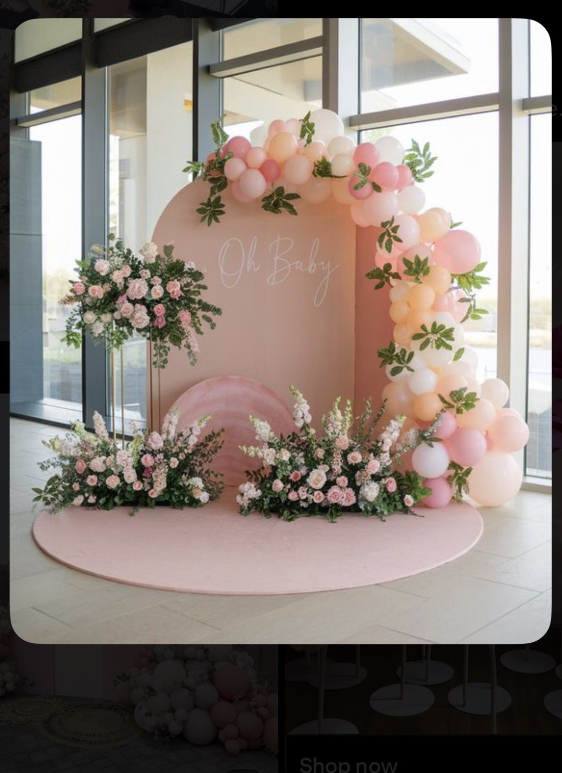 pink floral backdrop A rounded pink backdrop framed by pink and white floral clusters, shown in a supplied reference screenshot.
